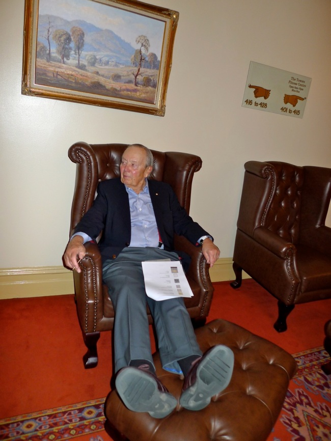 Laurence G Cox AO puts his feet up